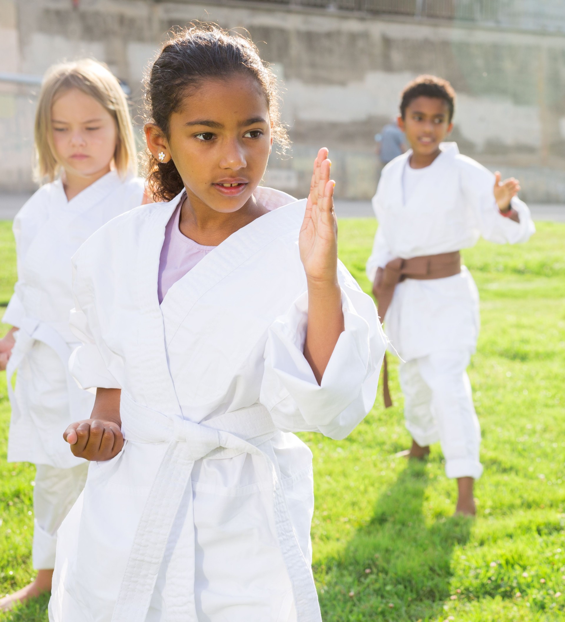 Girl in kimono posing outdoors